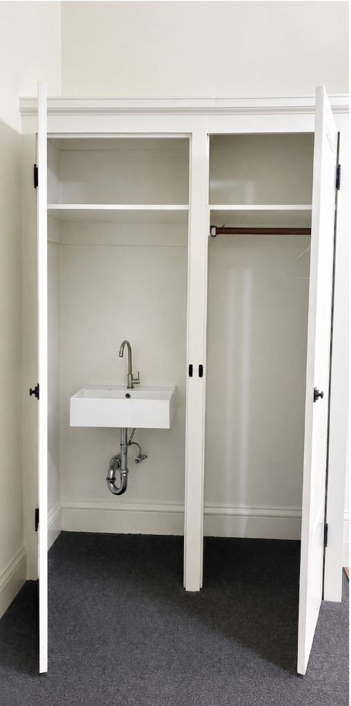 Suite 203 built-in sink and storage closet